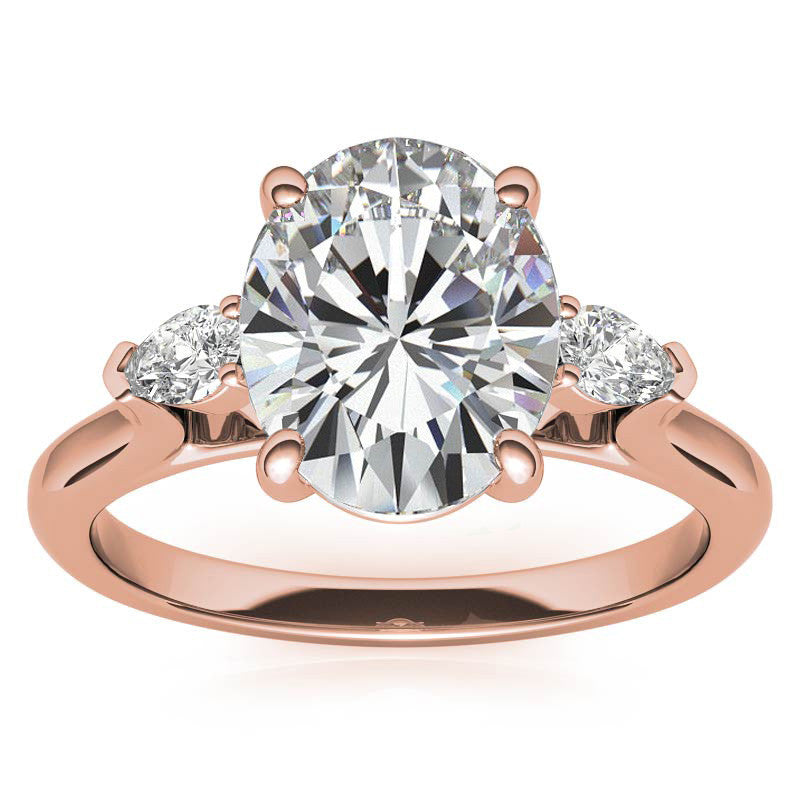 Oval and Pear Three-Stone Moissanite Engagement Ring