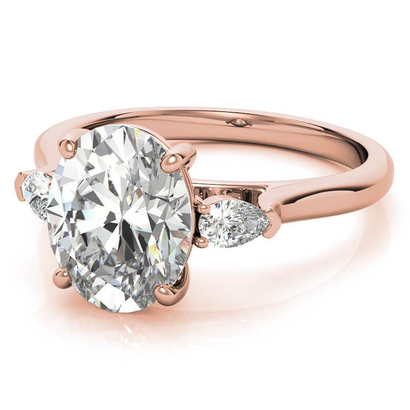 Oval and Pear Three-Stone Moissanite Engagement Ring