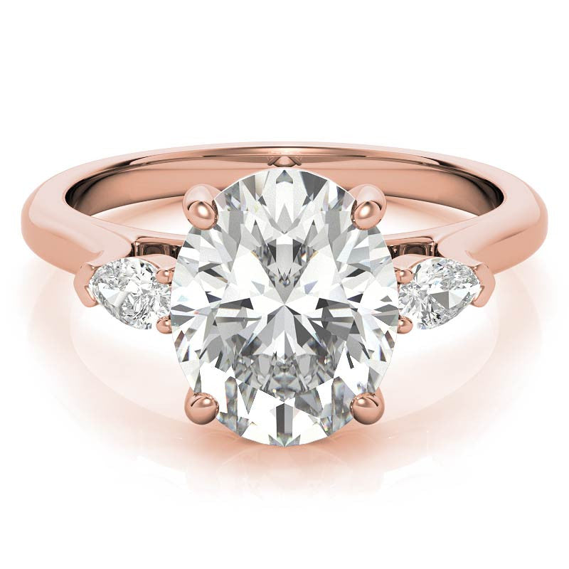 Oval and Pear Three-Stone Moissanite Engagement Ring