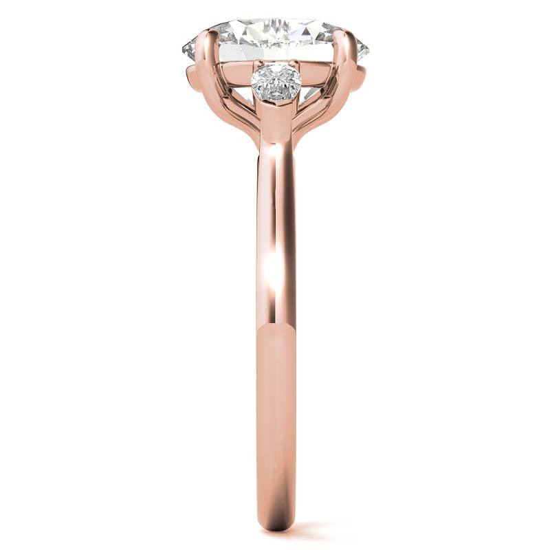 Oval and Pear Three-Stone Moissanite Engagement Ring