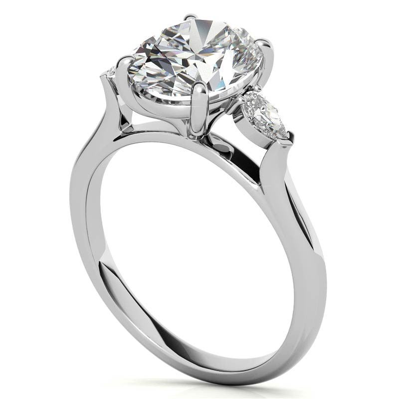 Oval and Pear Three-Stone Moissanite Engagement Ring