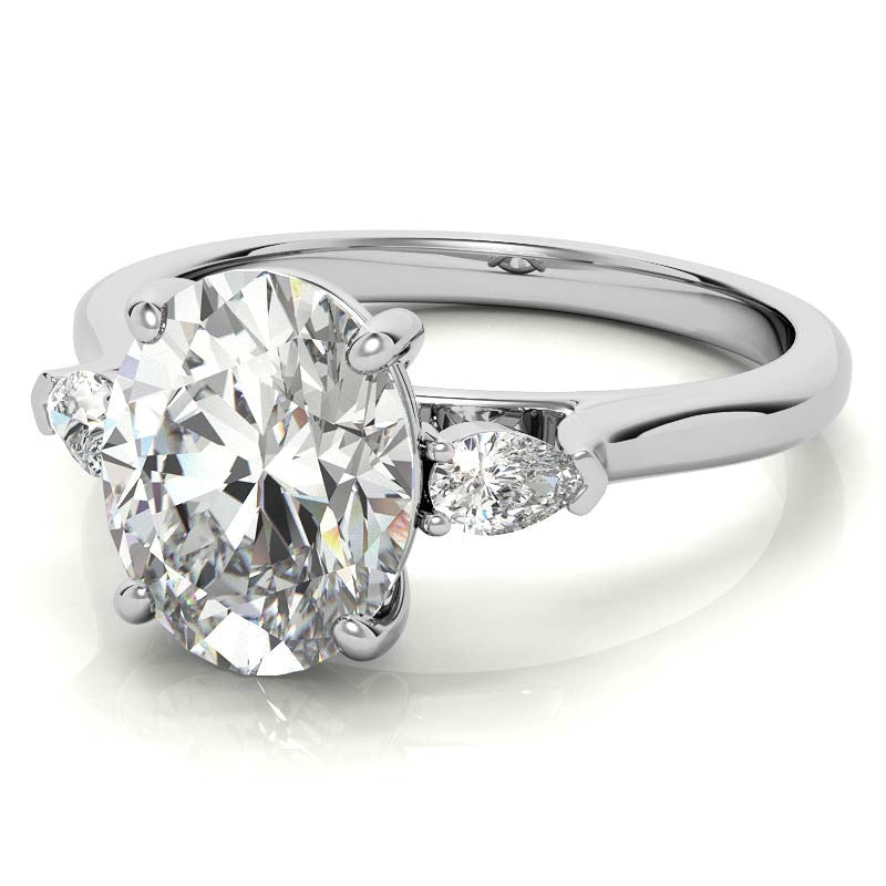 Oval and Pear Three-Stone Moissanite Engagement Ring