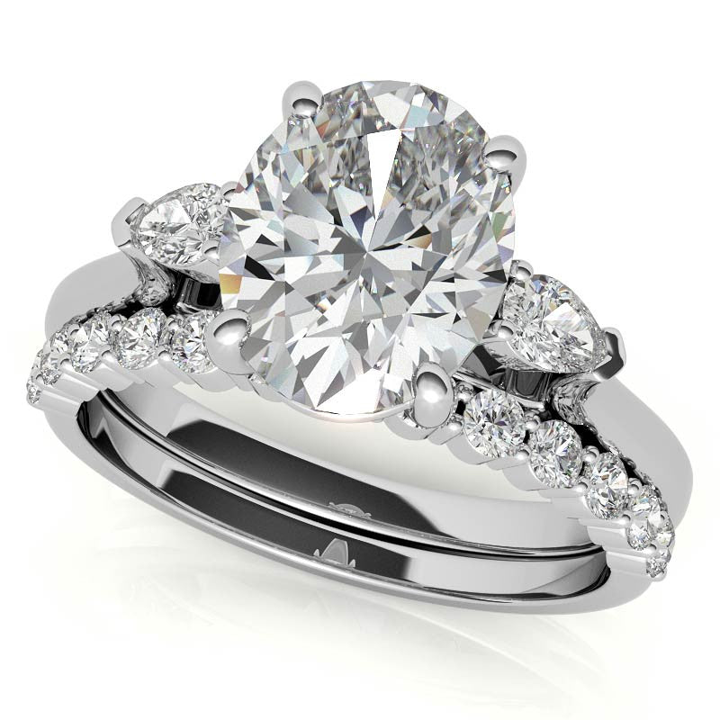 Oval and Pear Three-Stone Moissanite Engagement Ring