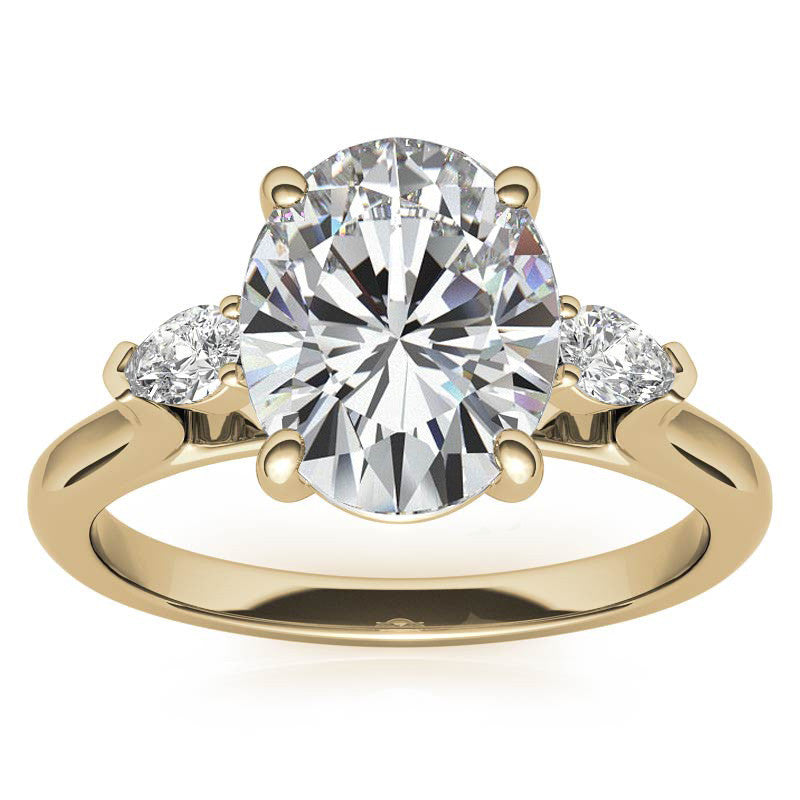 Oval and Pear Three-Stone Moissanite Engagement Ring
