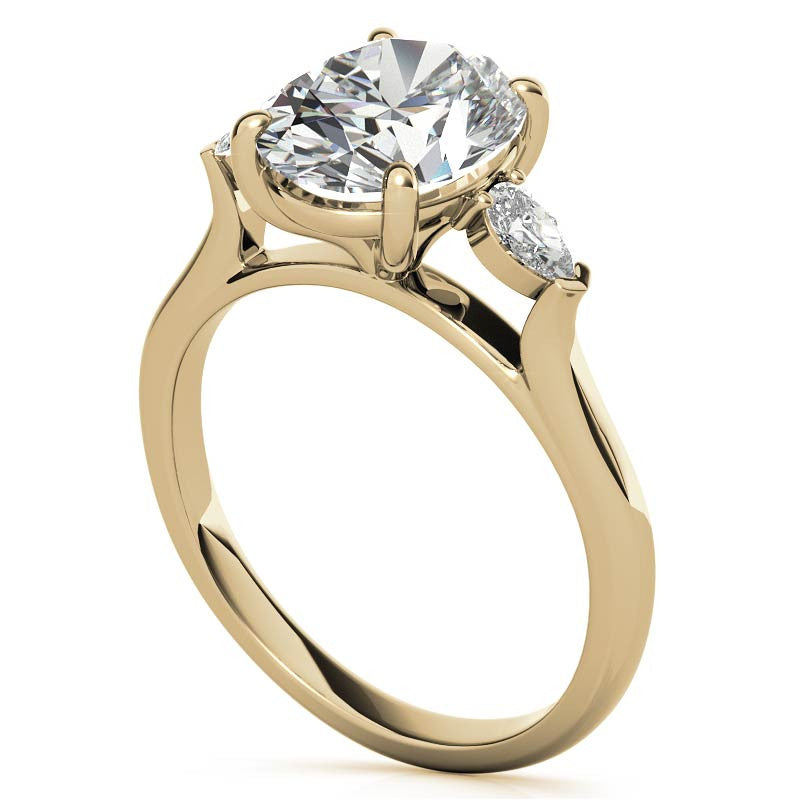 Oval and Pear Three-Stone Moissanite Engagement Ring