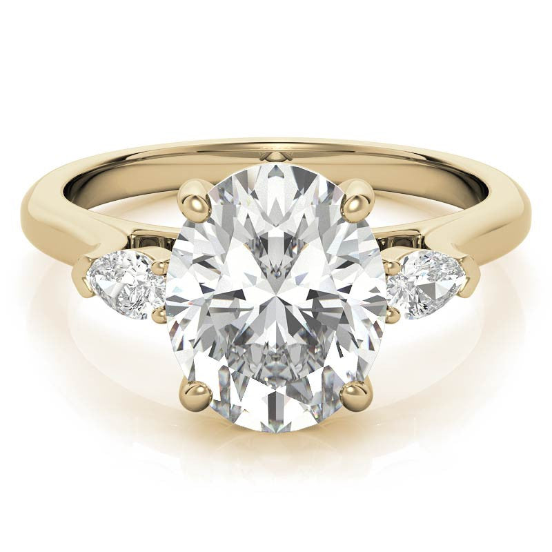 Oval and Pear Three-Stone Moissanite Engagement Ring