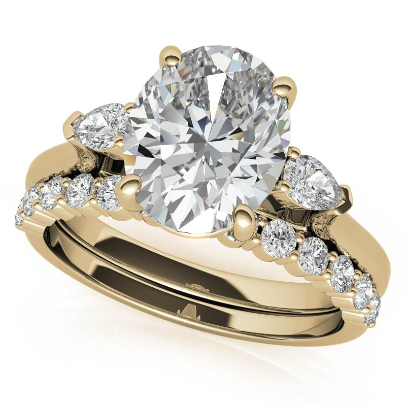Oval and Pear Three-Stone Moissanite Engagement Ring