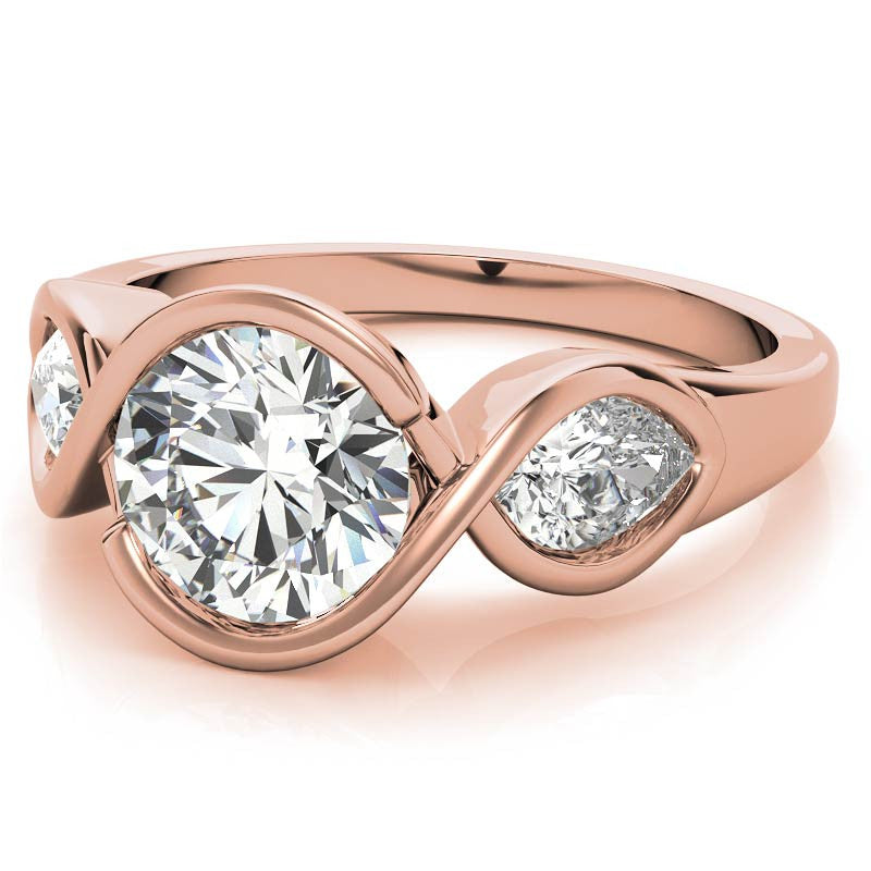 Round and Pear Bypass Three-Stone Moissanite Engagement Ring