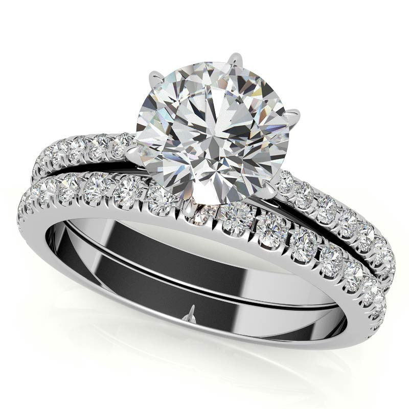 Round 6-prong Graduated Moissanite Engagement Ring