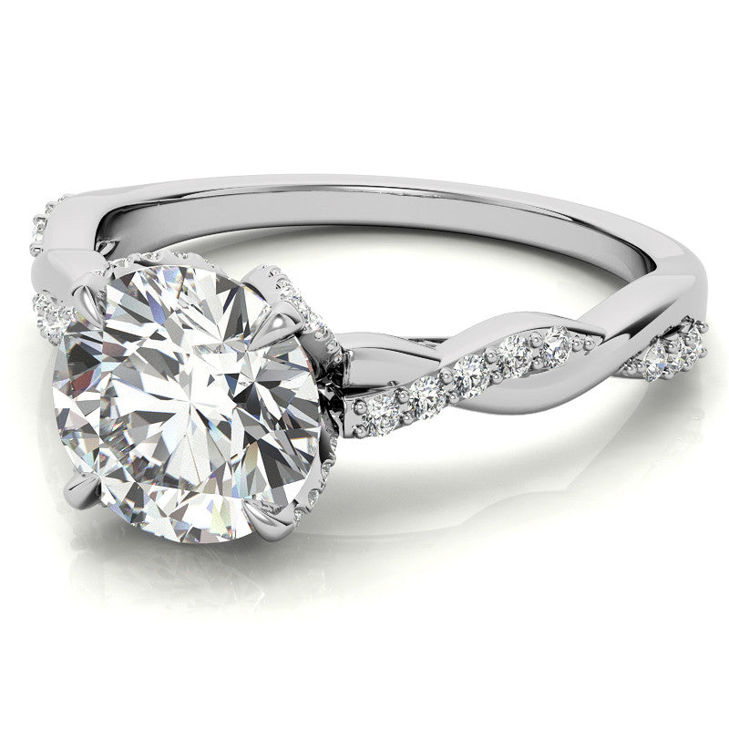 Round Brilliant Moissanite Infinity Twist Style Engagement Ring With Diamond Accented Tulip Prongs