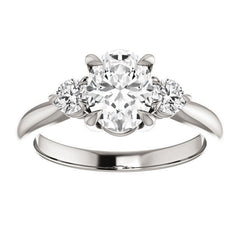 Oval and Round Moissanite 3-Stone Ring