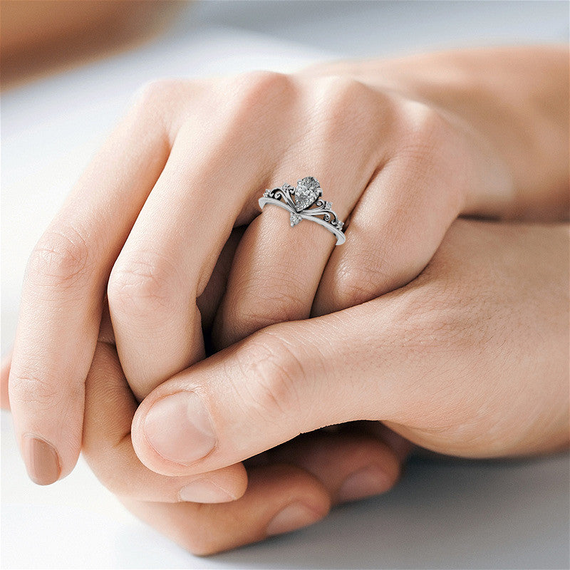 Crown Inspired Chevon Shaped Pear Moissanite Engagement Ring