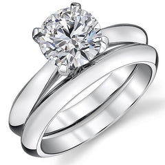 Round Brilliant Moissanite Tapered Knife Edge Solitaire Ring