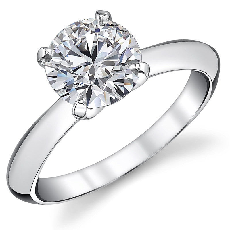 Round Brilliant Moissanite Tapered Knife Edge Solitaire Ring