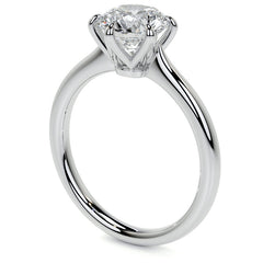 Petite Round Brilliant Moissanite Solitaire Ring