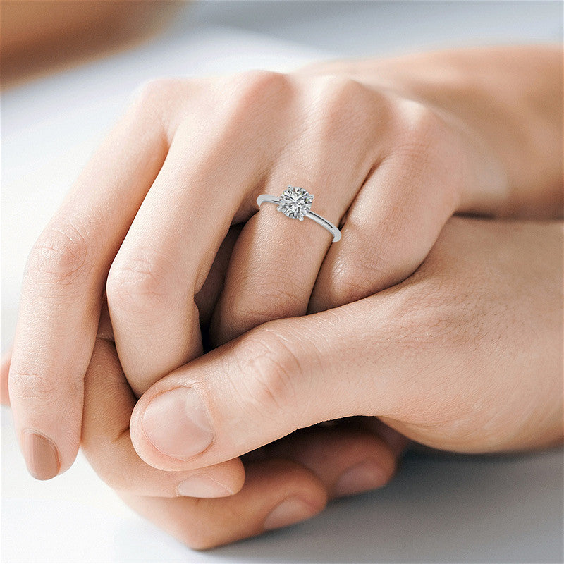 Petite Round Brilliant Moissanite Solitaire ring