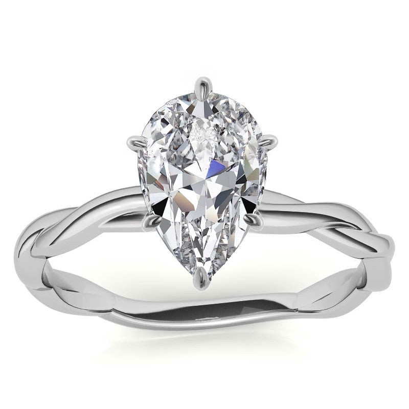 Petite Twisted Infinity Moissanite Solitaire Ring