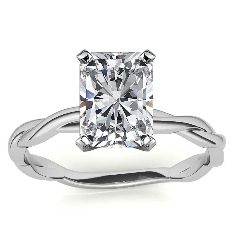 Petite Twisted Infinity Moissanite Solitaire Ring