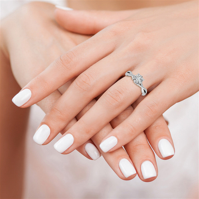 Round Infinity Style Moissanite Solitaire Ring with Leaf Accents