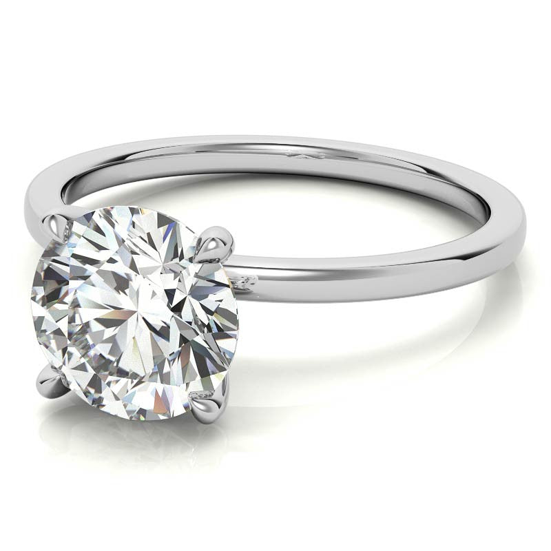 Petite 4-Prong Round Brilliant Moissanite Solitaire Ring