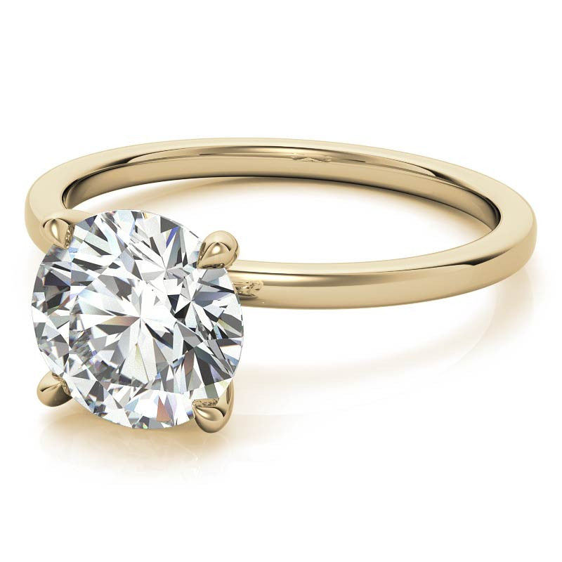 Petite 4-Prong Round Brilliant Moissanite Solitaire Ring