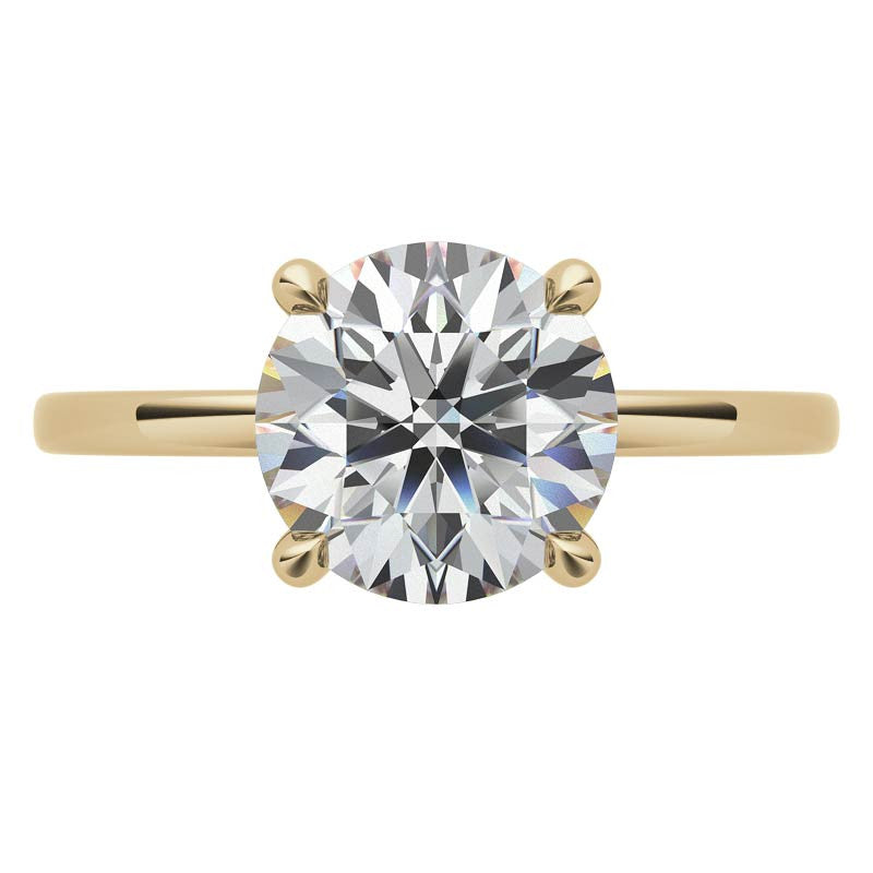 Petite 4-Prong Round Brilliant Moissanite Solitaire Ring