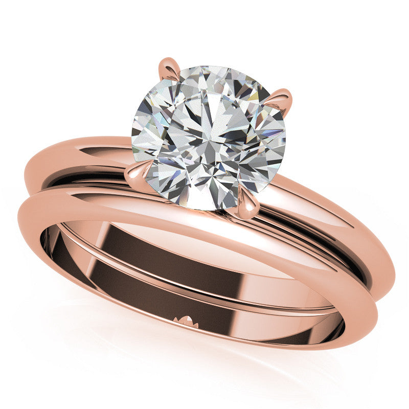 4 Prong Round Brilliant Moissanite Knife Edge Solitaire