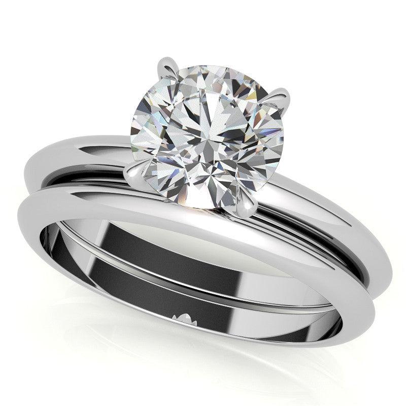 4 Prong Round Brilliant Moissanite Knife Edge Solitaire
