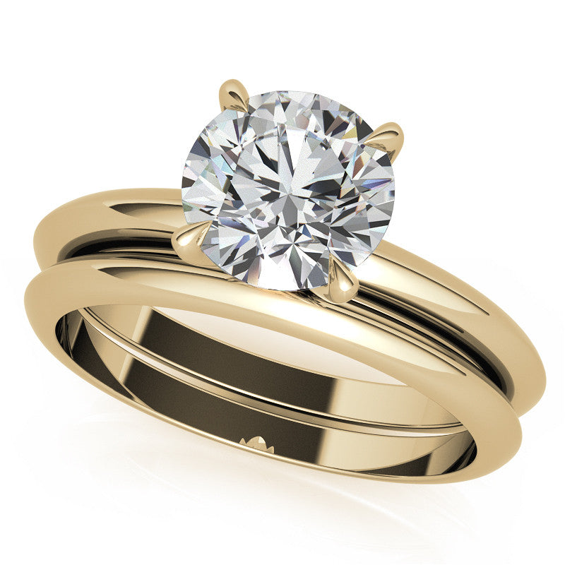 4 Prong Round Brilliant Moissanite Knife Edge Solitaire