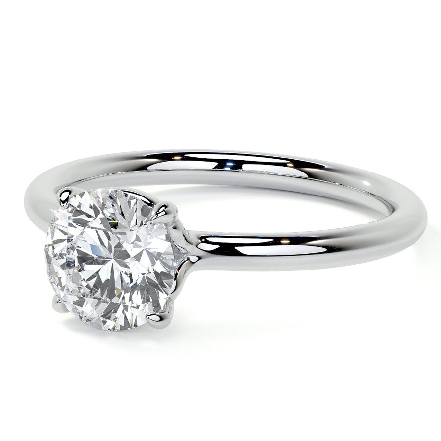 Petite 4-Prong Round Basket Moissanite Solitaire Ring