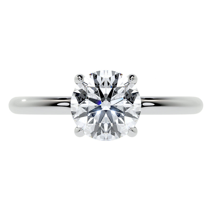 Petite 4-Prong Round Basket Moissanite Solitaire Ring