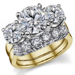 5.5ct (9.5mm,6.5mm) Round Brilliant Moissanite Three Stone Ring