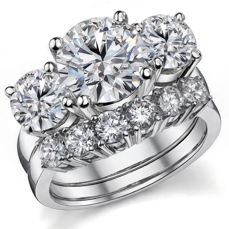 5.5ct (9.5mm,6.5mm) Round Brilliant Moissanite Three Stone Ring