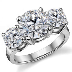 5.5ct (9.5mm,6.5mm) Round Brilliant Moissanite Three Stone Ring