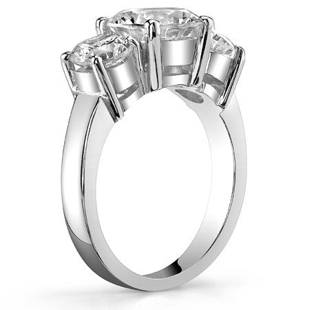5.0ct (9.0mm,6.5mm) Round Brilliant Moissanite Three Stone Ring