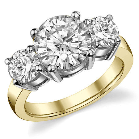 4.0ct (9.0mm,5.0mm) Round Brilliant Moissanite Three Stone Ring