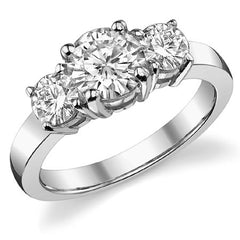 1.7ct (6.5mm,4.5mm) Round Brilliant Moissanite Three Stone Ring