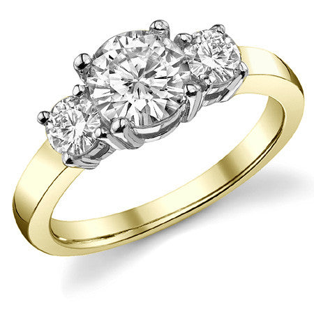 1.5ct (6.5mm,4mm) Round Brilliant Moissanite Three Stone Ring