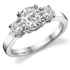 1.5ct (6.5mm,4mm) Round Brilliant Moissanite Three Stone Ring