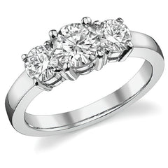 1.4ct (6mm,4.5mm) Round Brilliant Moissanite Three Stone Ring