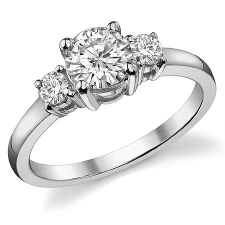 0.95ct (6mm,3mm) Round Brilliant Moissanite Three Stone Ring