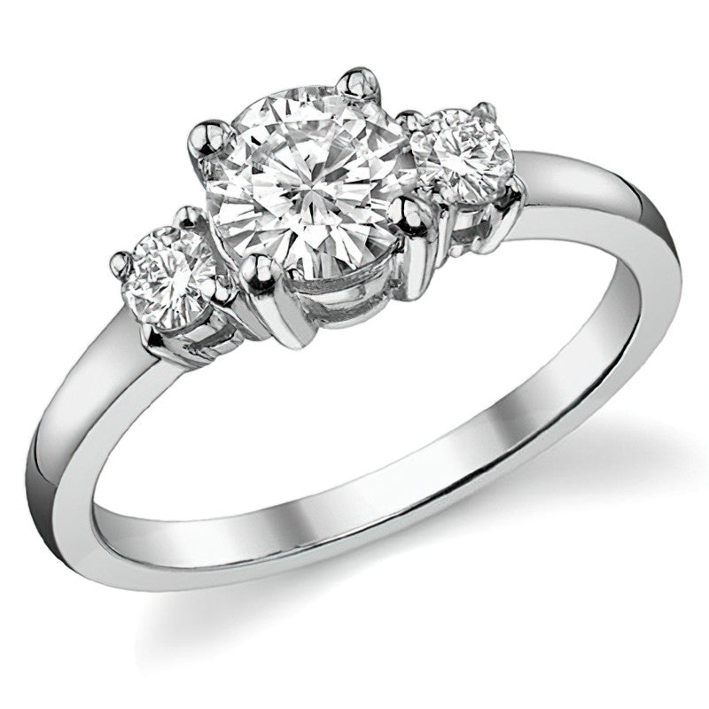0.95ct (6mm,3mm) Round Brilliant Moissanite Three Stone Ring