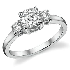 0.95ct (6mm,3mm) Round Brilliant Moissanite Three Stone Ring
