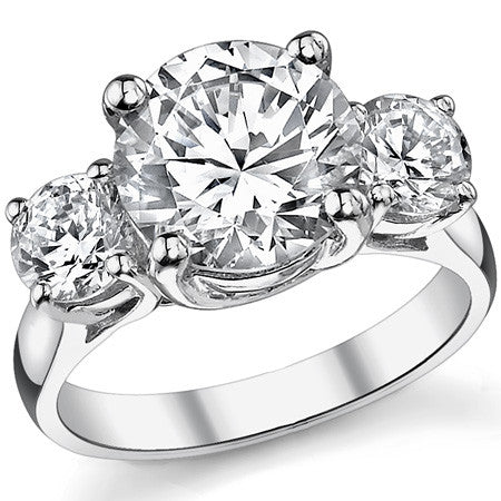 4.5ct (9.5/5mm) Round Brilliant Moissanite Trellis 3 Stone Ring