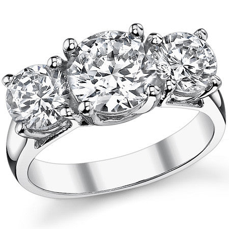 3.0ct (7.5/6.0mm) Round Brilliant Moissanite Trellis 3 Stone Ring