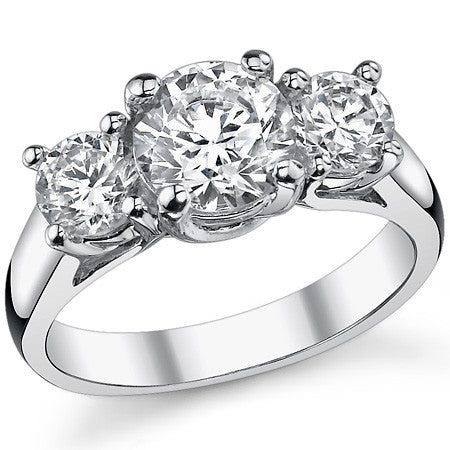 2.25ct (7mm/5mm) Round Brilliant Moissanite Trellis 3 Stone Ring