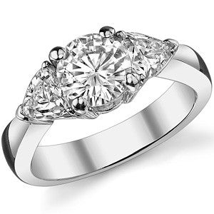 1.7ct (6.5mm/4.5mm) Round & Trillion Moissanite Three Stone Ring