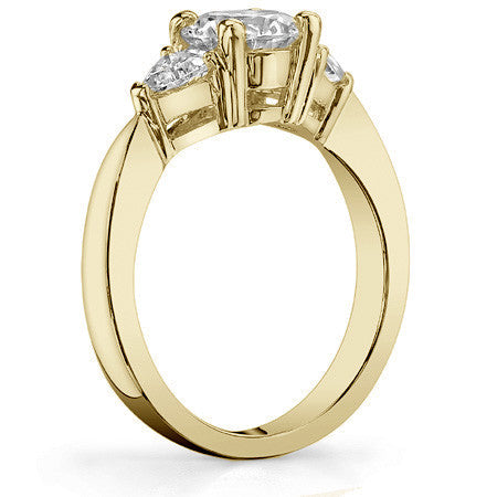 0.82ct (5mm/3.5mm) Round & Trillion Moissanite Three Stone Ring