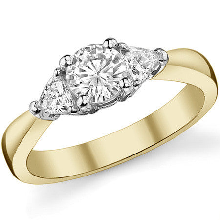 0.82ct (5mm/3.5mm) Round & Trillion Moissanite Three Stone Ring