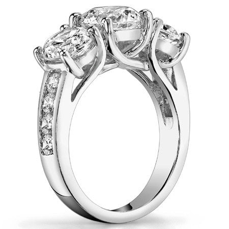 3.3ct (8mm/5mm) Round Brilliant Moissanite Trellis Three-Stone Ring
